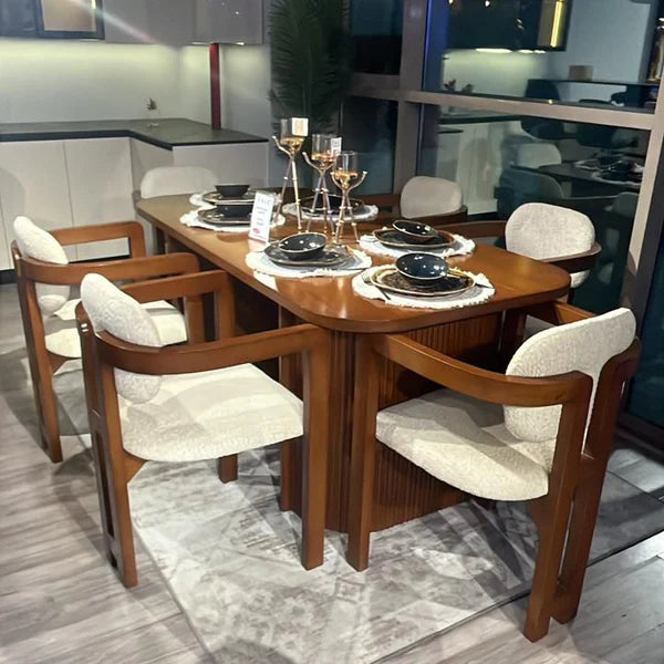 Dining table set with chairs in a modern kitchen setting