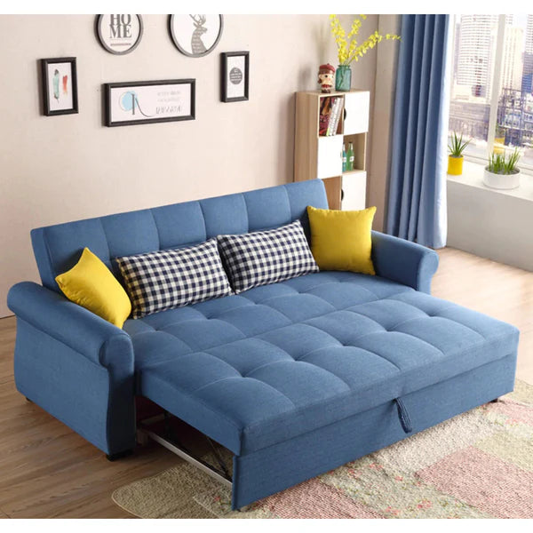 Blue sofa bed with colorful cushions in a living room setting.