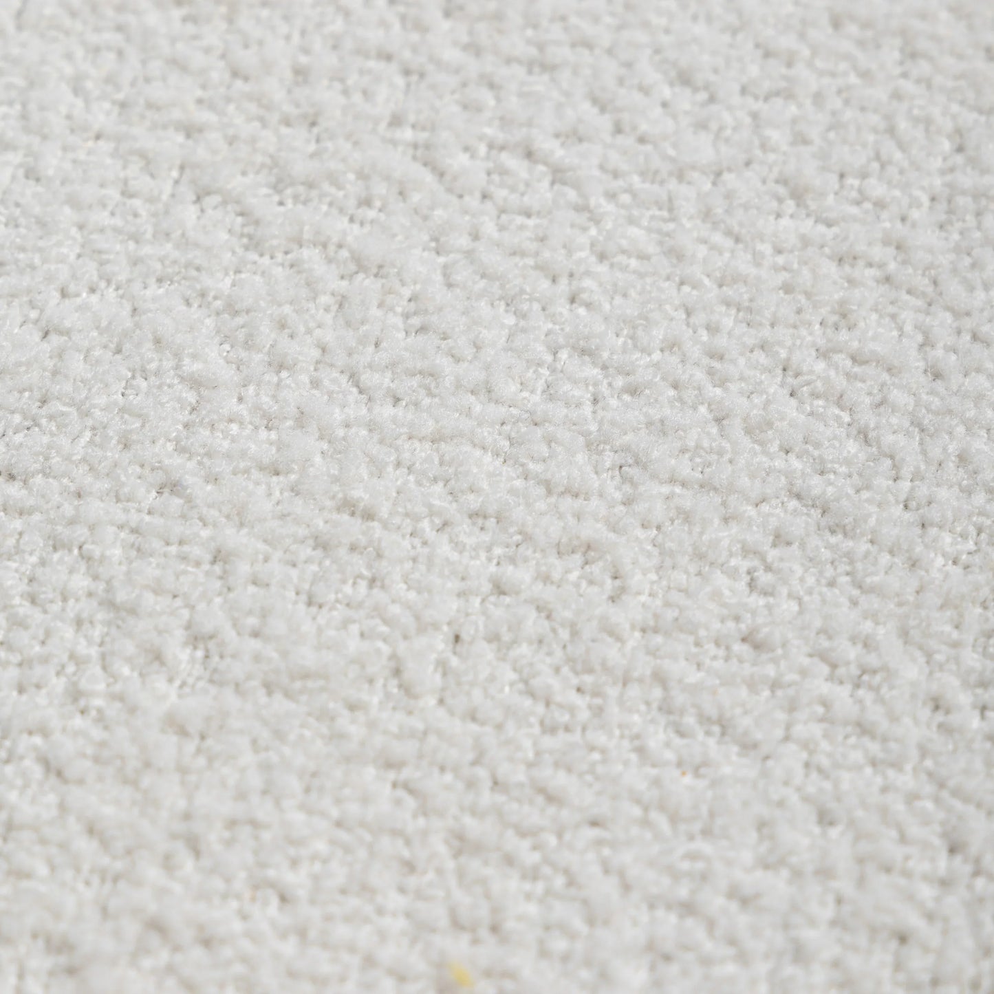 Close-up of a textured white fabric surface