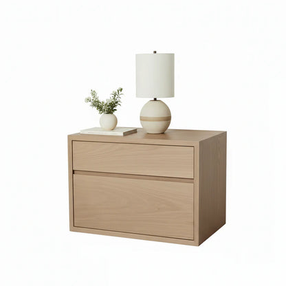 Wooden nightstand with a lamp and plant on a white background