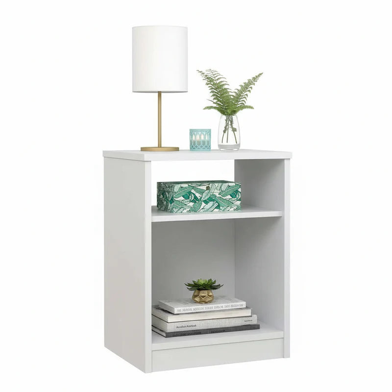 White bookshelf with decorative items on a white background