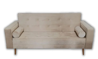 Beige sofa with buttoned backrest on a white background