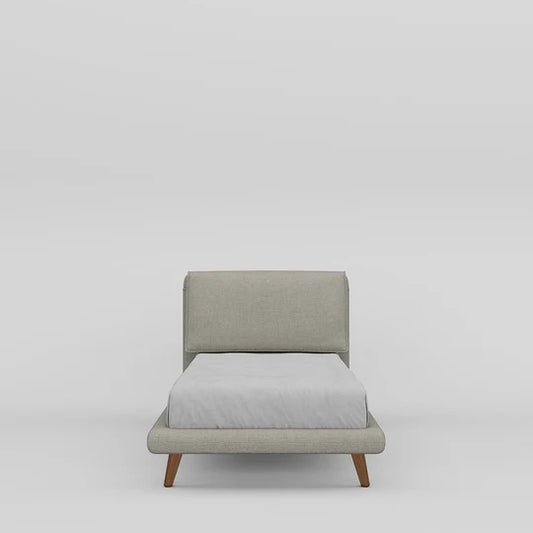 Gray upholstered chair with a white cushion on a light gray background