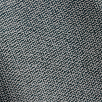Close-up of a textured teal fabric pattern