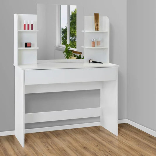 White vanity with mirror and shelves against a gray wall.
