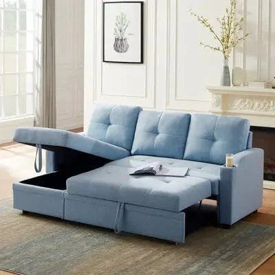 Blue sectional sofa with storage drawers in a living room setting.