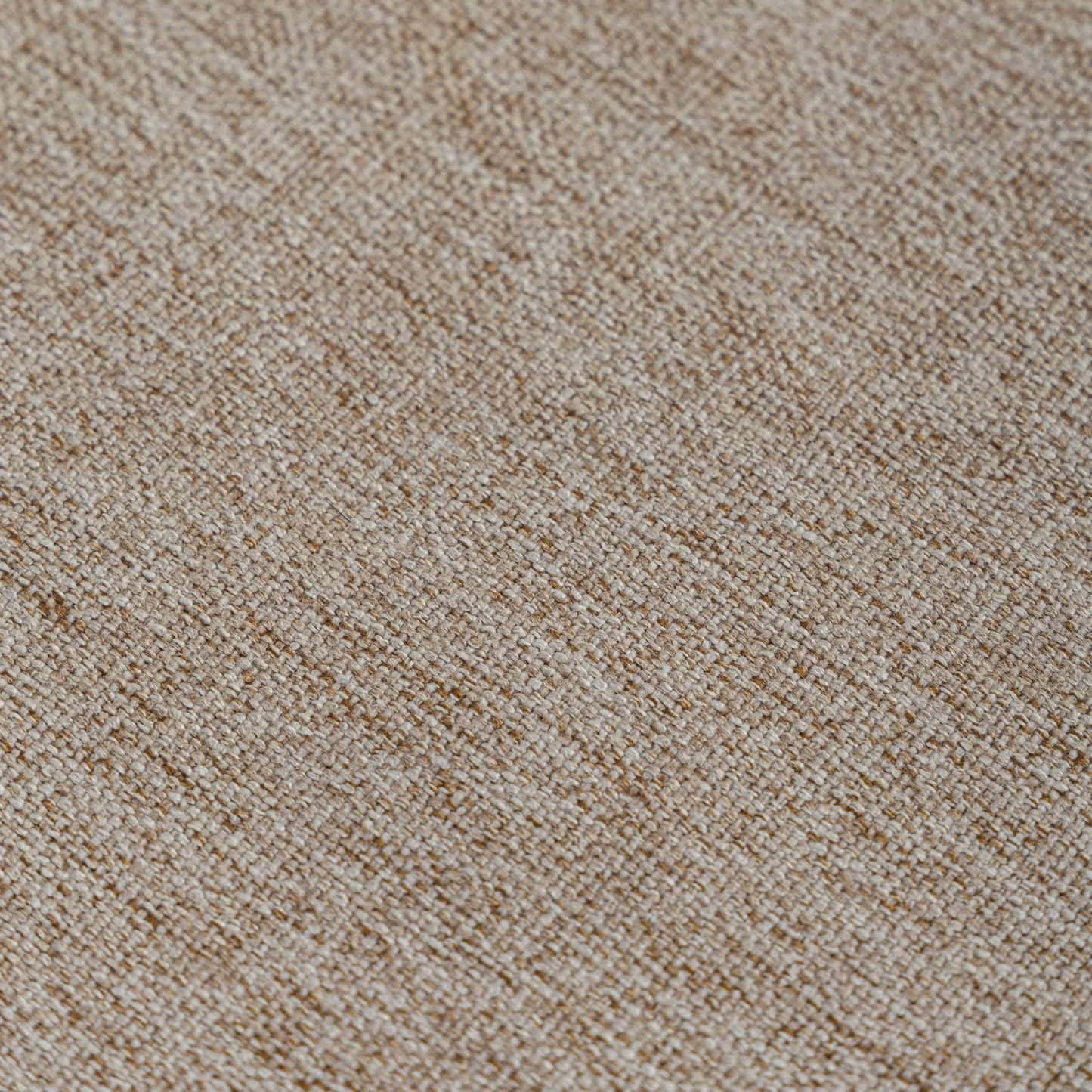 Close-up of a textured beige carpet