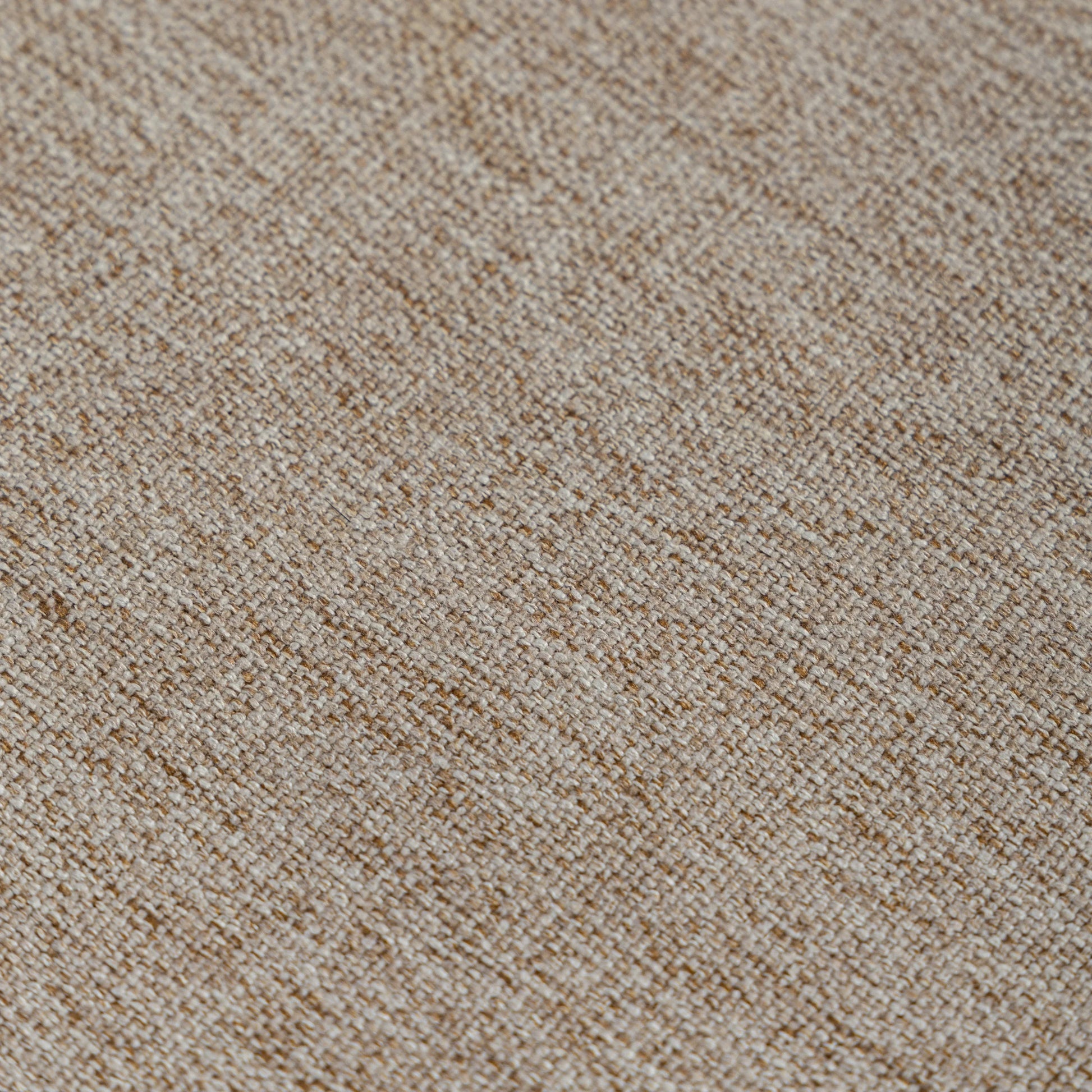 Close-up of a textured beige carpet