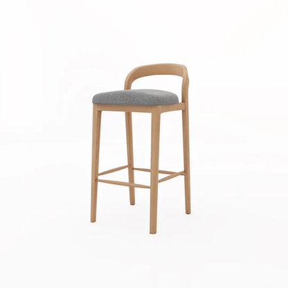 Wooden bar stool with a gray cushion on a white background