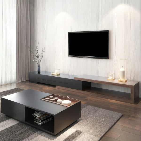Modern living room with a TV mounted on the wall and a coffee table in front.