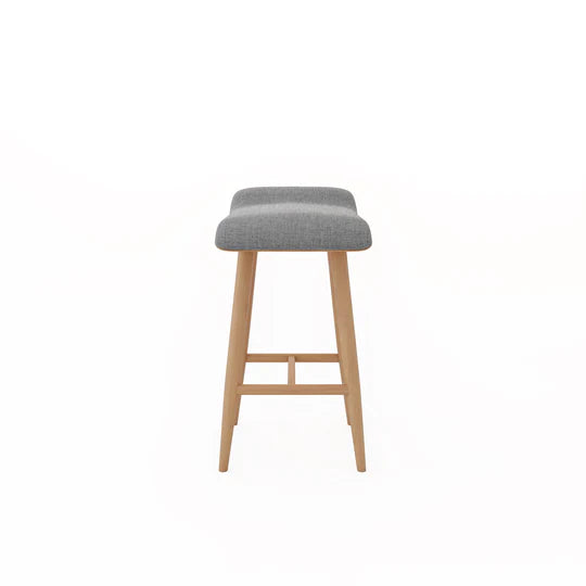 Bar stool with gray cushioned seat and wooden legs on a white background
