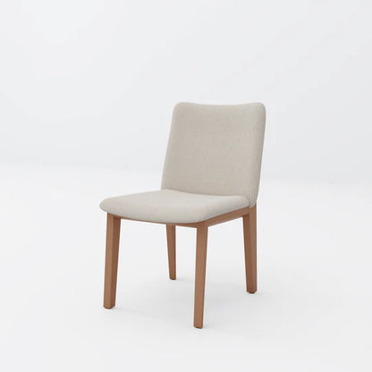 Beige chair with wooden legs on a white background